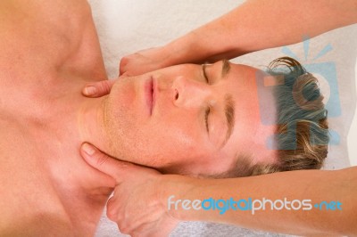 Man Receiving Neck Massage Stock Photo