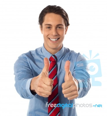 Man Showing Thumb Up Gesture Stock Photo