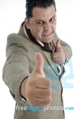 Man Showing Thumbs Up Gesture Stock Photo