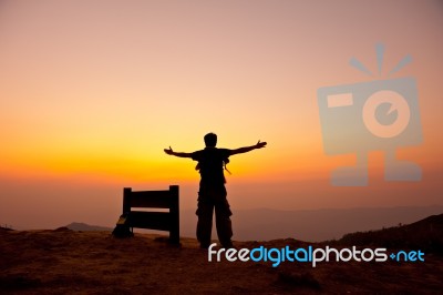 Man Stand On Mountain Stock Photo