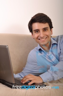 Man Surfing The Web Stock Photo