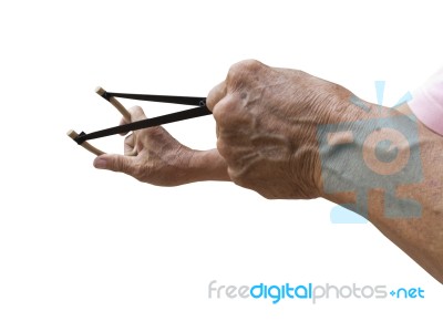 Man With Slingshot Aimed To Shoot Stock Photo