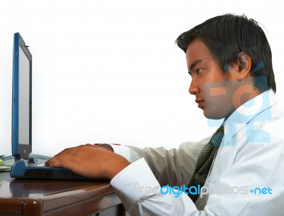 Man Working On His Computer Stock Photo