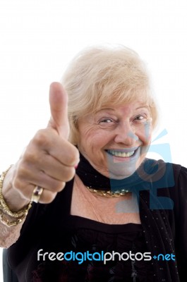 mature Woman Showing Thumb Up Stock Photo