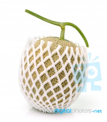 Melon, Cantaloupe In Net Bag, Isolated On White Background Stock Photo