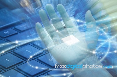 Microchip In Hand Stock Photo