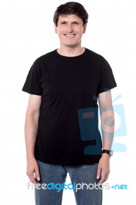 Middle Aged Man Posing Casually Stock Photo
