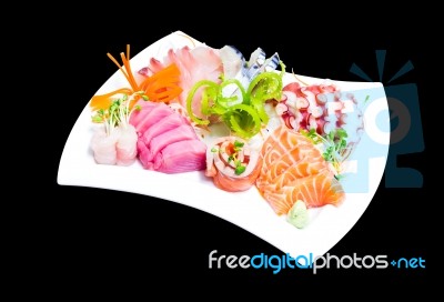 Mixed Sashimi In White Plate Isolated On Black Background,with C… Stock Photo