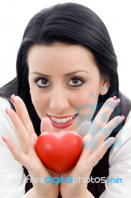 Model Holding Small Red Heart Stock Photo