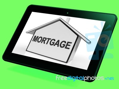 Mortgage House Tablet Shows Property Loans And Repayments Stock Image