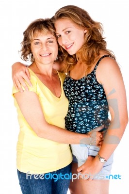 Mother And Daughter Embracing Each Other Stock Photo