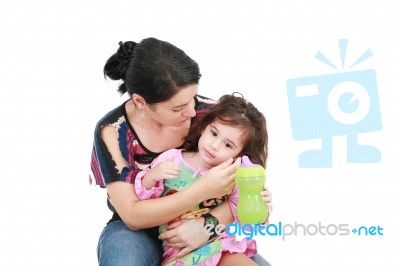 Mother Hugging Her Daughter Stock Photo