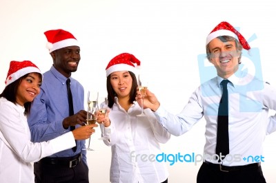 Multi-ethnic Team Celebrating Christmas Stock Photo