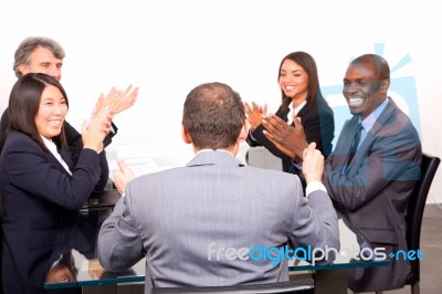 Multi Ethnic Team During Meeting Stock Photo