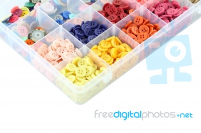 Multiple Color Buttons Focus Corner In Plastic Box On White Background Stock Photo