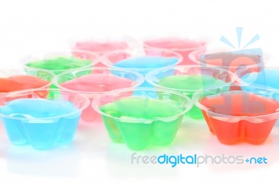Multiple Color Jelly In Cup On White Floor Stock Photo