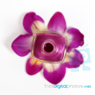 Nail Polish On Orchid Petals Stock Photo