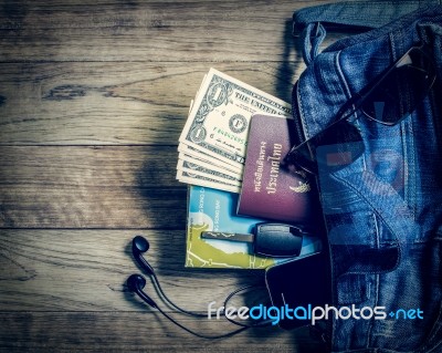 Necessary Object For Travelers In Denim Handbag Stock Photo
