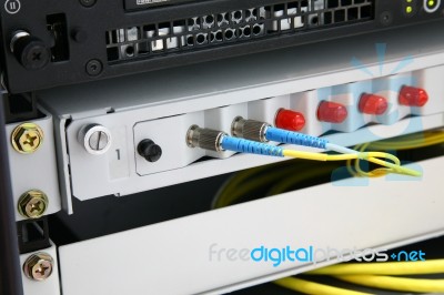 Network Switch And Patch Cables Stock Photo