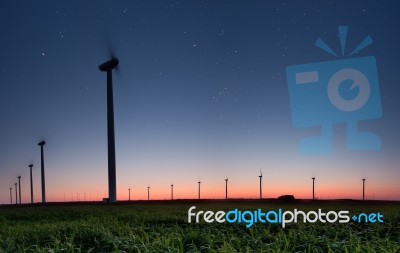 Night Under Wind Turbine Stock Photo