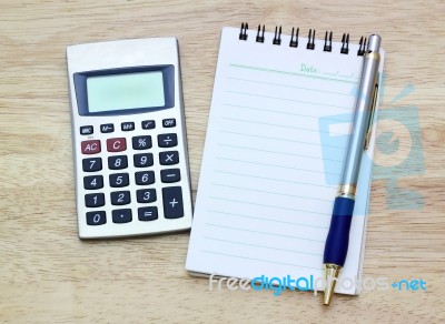 Notebook Pen And Calculator Stock Photo