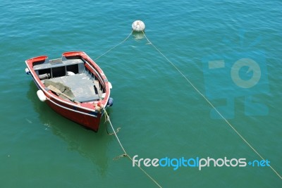 Old Fishing Boat At The Port In Cascais, Portugal Stock Photo