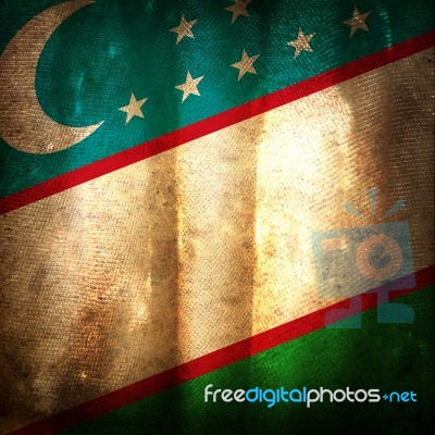 Old Grunge Flag Of Uzbekistan Stock Photo