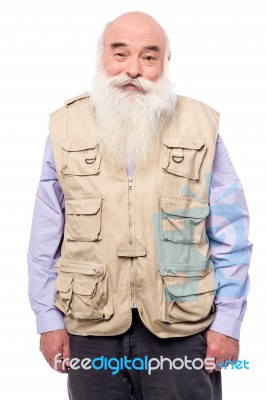 Old Man Wearing Sleeveless Jacket Stock Photo