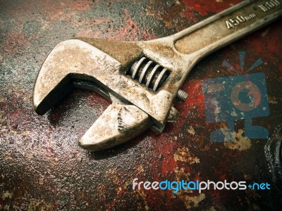 Old Wrench On The Fuel Tank Stock Photo