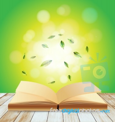 Open Book On Wood Planks Over Abstract Light Stock Image