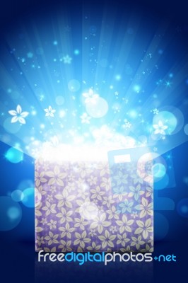 Open Magic Gift Box With Bright Light Stock Photo