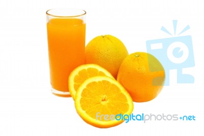 Orange Juice And Oranges Stock Photo