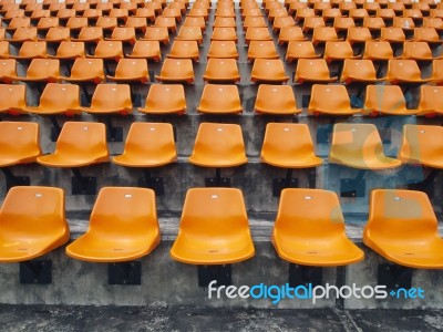 Orange Seats On The Stadium Stock Photo