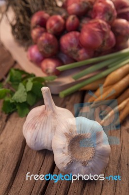 Organic Garlic On Wood Stock Photo