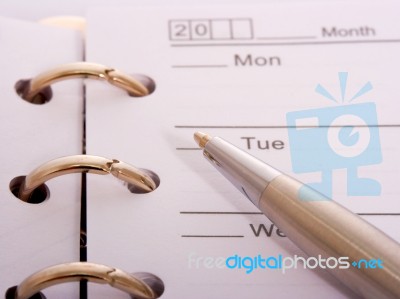 Organizing Schedule For Week Ahead Stock Photo