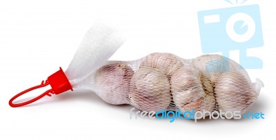 Packaged Garlic Isolated On White Stock Photo