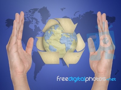 Paper Recycling Symbol On Hand Stock Photo