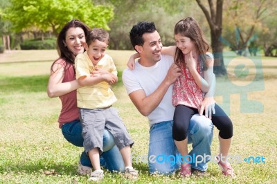 Parents With Two Kids Stock Photo