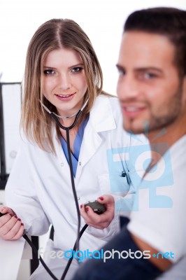 Patient Checking His Blood Pressure Stock Photo