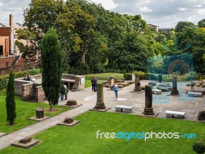 People Enjoying Roman Garden In Chester Stock Photo