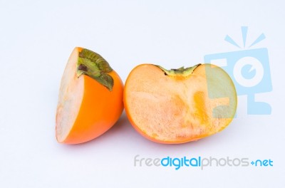Persimmon Fruit Cut One Side Front Stock Photo
