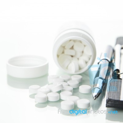 Pills Bottle With The Prescription On White Background Stock Photo