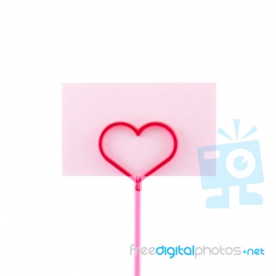 Pink Card In Heart Shaped Holder Stock Photo