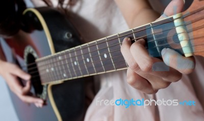 Playing Guitar Stock Photo