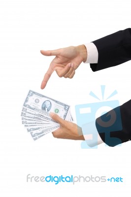Point To Cash In Business Man On White Background Stock Photo