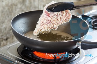 Pork Fried In A Pan Stock Photo