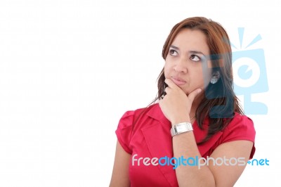 Portrait Of A Beautiful Young Businesswoman With A Thinking Expr… Stock Photo