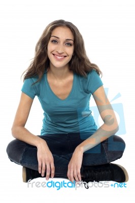 Portrait Of A Happy Young Woman Smiling Stock Photo