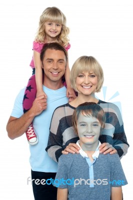 Portrait Of Happy Family Of Four Persons Stock Photo