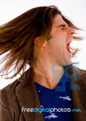 Portrait Of Shouting Young Male Stock Photo